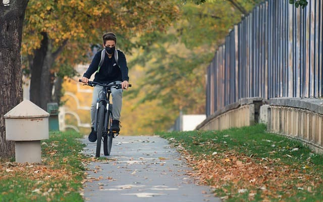 A boy riding a bicycle